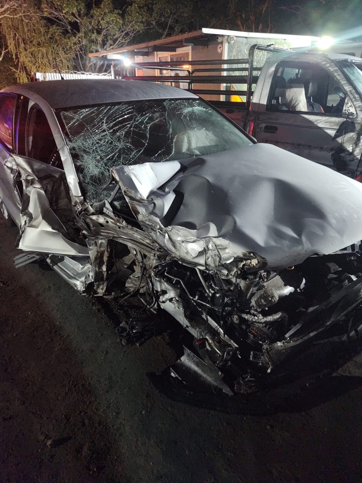 Front-left corner of the Polo, torn open to the engine bay